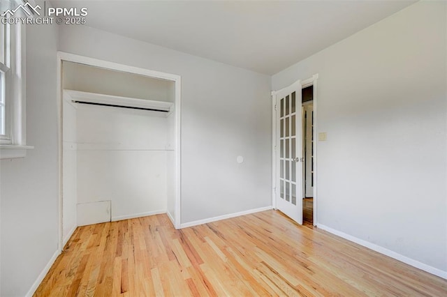 3118 E Ln Salle St, Colorado Springs, CO 80909 - unfurnished bedroom with wood finished floors, a closet, and french doors