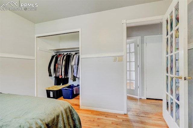 3118 E Ln Salle St, Colorado Springs, CO 80909 - bedroom featuring wood finished floors, french doors, and a closet