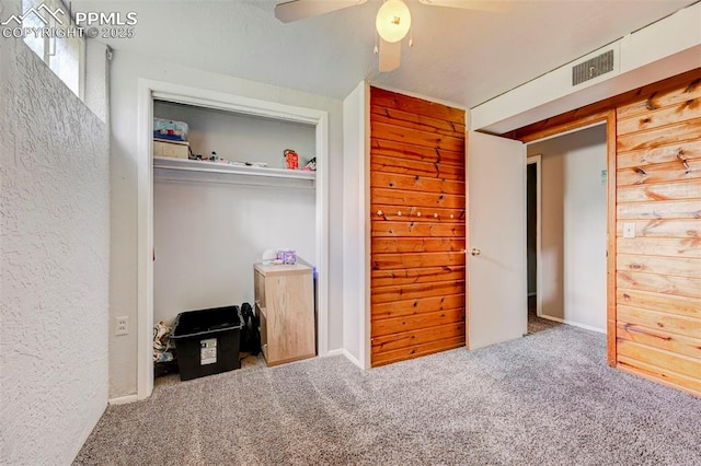 3118 E Ln Salle St, Colorado Springs, CO 80909 - unfurnished bedroom featuring carpet floors, a ceiling fan, a closet, and a textured wall