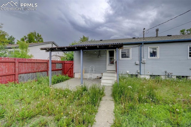 3118 E Ln Salle St, Colorado Springs, CO 80909 - rear view of property with a patio area