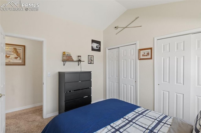 3320 Chestnut Glen Ln, Colorado Springs, CO 80918 - carpeted bedroom with vaulted ceiling, multiple closets, and baseboards