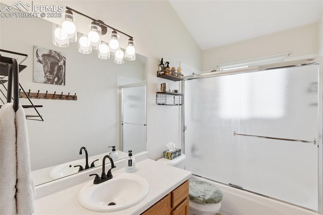 3320 Chestnut Glen Ln, Colorado Springs, CO 80918 - full bath with vanity, toilet, vaulted ceiling, and enclosed tub / shower combo