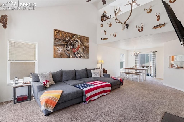 3320 Chestnut Glen Ln, Colorado Springs, CO 80918 - living room featuring carpet floors, a chandelier, ceiling fan, high vaulted ceiling, and baseboards