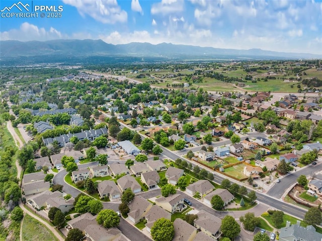 3320 Chestnut Glen Ln, Colorado Springs, CO 80918 - aerial view of residential area with mountains