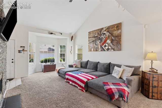 3320 Chestnut Glen Ln, Colorado Springs, CO 80918 - carpeted living area featuring high vaulted ceiling and ceiling fan