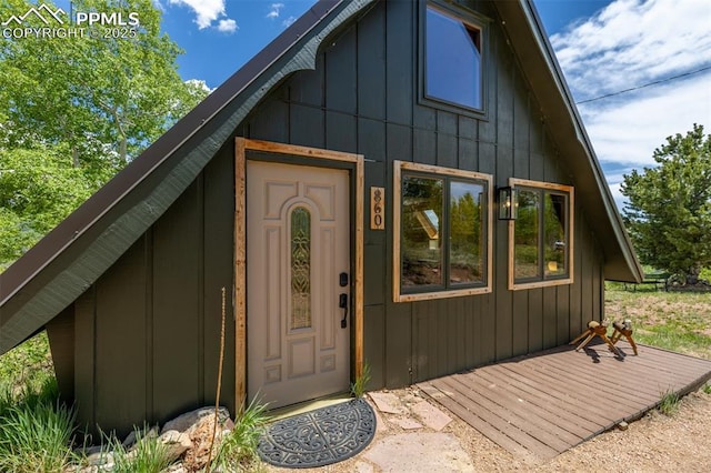 860 Golden Cycle Cir, Cripple Creek, CO 80813 - entrance to property with board and batten siding