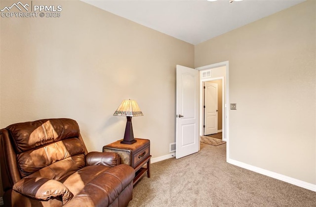 10702 Black Kettle Way, Colorado Springs, CO 80908 - living area featuring light carpet and baseboards