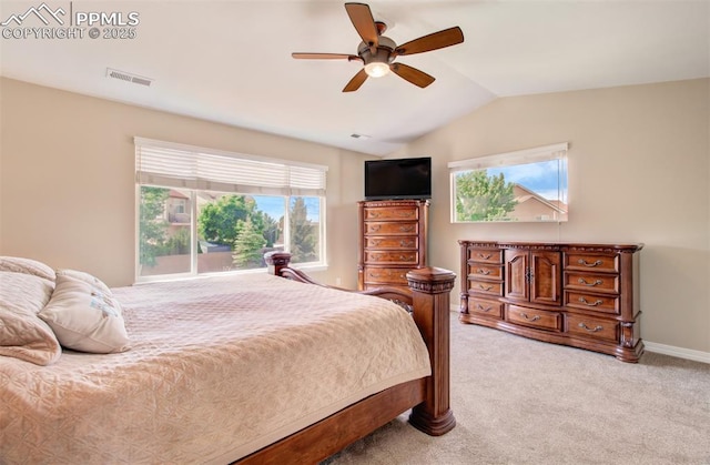 10702 Black Kettle Way, Colorado Springs, CO 80908 - bedroom featuring vaulted ceiling, light colored carpet, and a ceiling fan