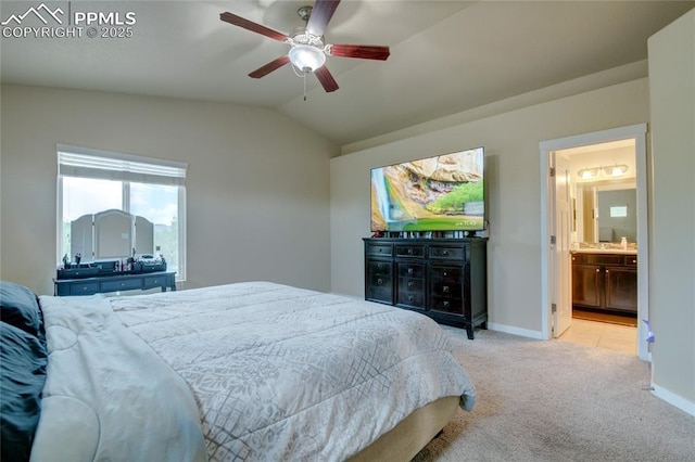 2485 Falkirk Dr, Colorado Springs, CO 80910 - bedroom with carpet, vaulted ceiling, ensuite bath, ceiling fan, and baseboards