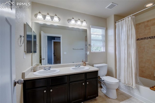2485 Falkirk Dr, Colorado Springs, CO 80910 - bathroom with toilet, double vanity, shower / bath combination with curtain, and tile patterned flooring