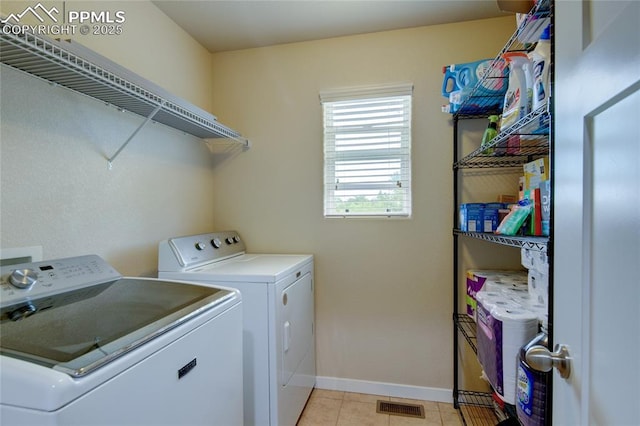 2485 Falkirk Dr, Colorado Springs, CO 80910 - laundry area with separate washer and dryer and baseboards