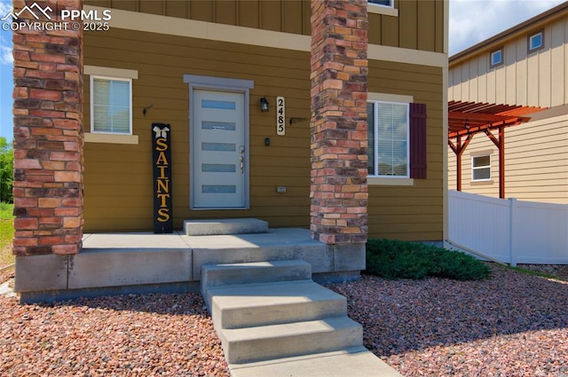 2485 Falkirk Dr, Colorado Springs, CO 80910 - property entrance featuring board and batten siding and a porch