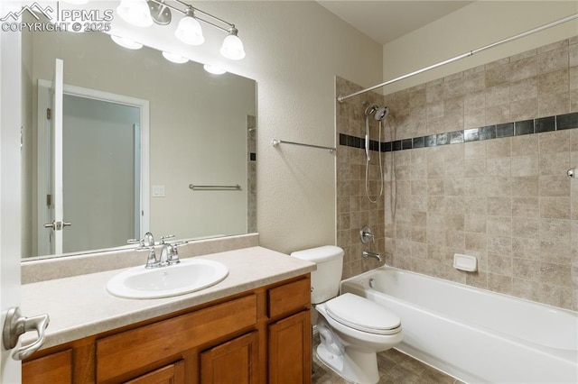4410 Campus Bluffs Ct, Colorado Springs, CO 80918 - bathroom with vanity, shower / bath combination, and a textured wall