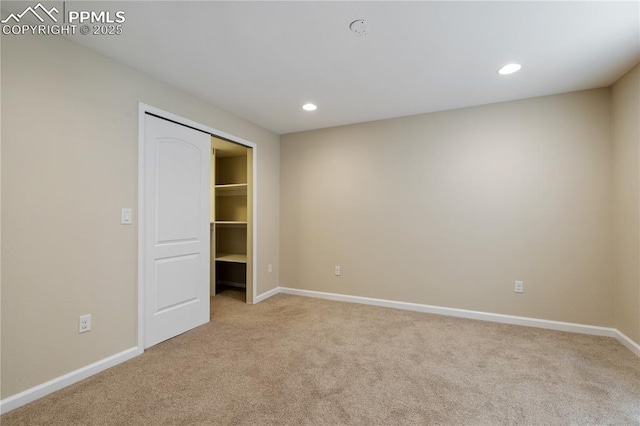 4410 Campus Bluffs Ct, Colorado Springs, CO 80918 - unfurnished bedroom with light carpet, recessed lighting, and a closet
