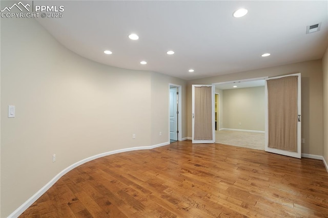 4410 Campus Bluffs Ct, Colorado Springs, CO 80918 - spare room with recessed lighting and light wood-type flooring