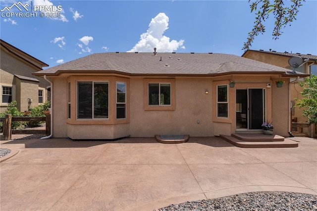4410 Campus Bluffs Ct, Colorado Springs, CO 80918 - rear view of property with a patio and stucco siding