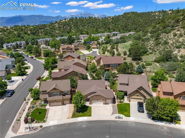 4410 Campus Bluffs Ct, Colorado Springs, CO 80918 - aerial view of residential area featuring a mountainous background