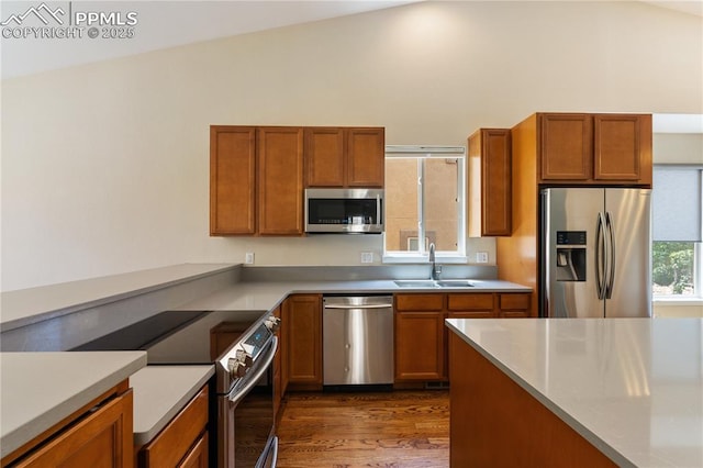 4410 Campus Bluffs Ct, Colorado Springs, CO 80918 - kitchen featuring stainless steel appliances, light countertops, and brown cabinetry