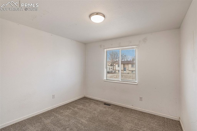 140 Schirra Pl, Pueblo, CO 81001 - carpeted empty room featuring baseboards
