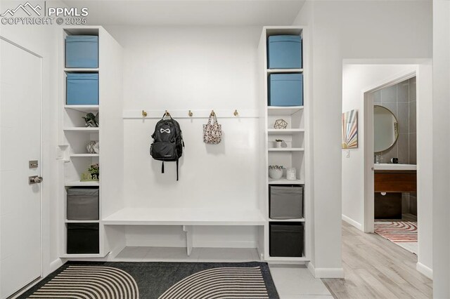 10423 Bergan Peak Ct, Colorado Springs, CO 80924 - mudroom featuring baseboards