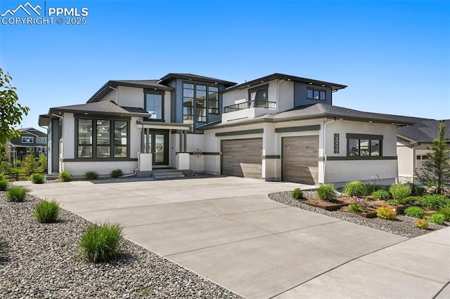 10423 Bergan Peak Ct, Colorado Springs, CO 80924 - view of front of house with a balcony, stucco siding, a garage, and concrete driveway