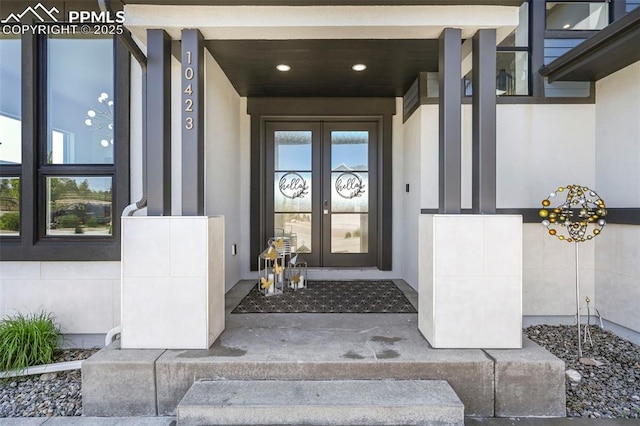 10423 Bergan Peak Ct, Colorado Springs, CO 80924 - property entrance with french doors and stucco siding