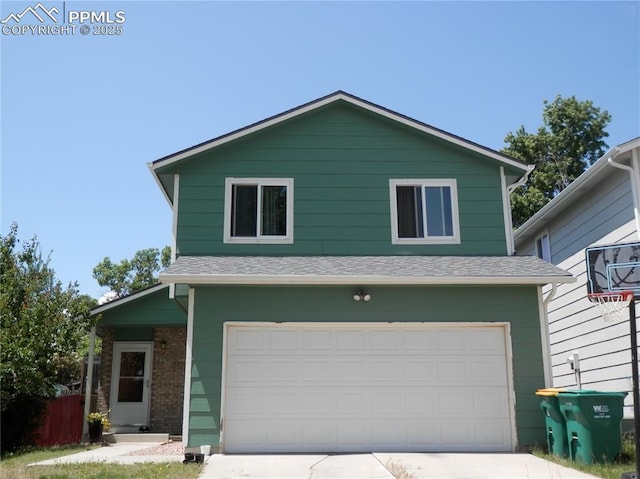 4450 Chaparral Rd, Colorado Springs, CO 80917 - view of front of house featuring a garage and driveway