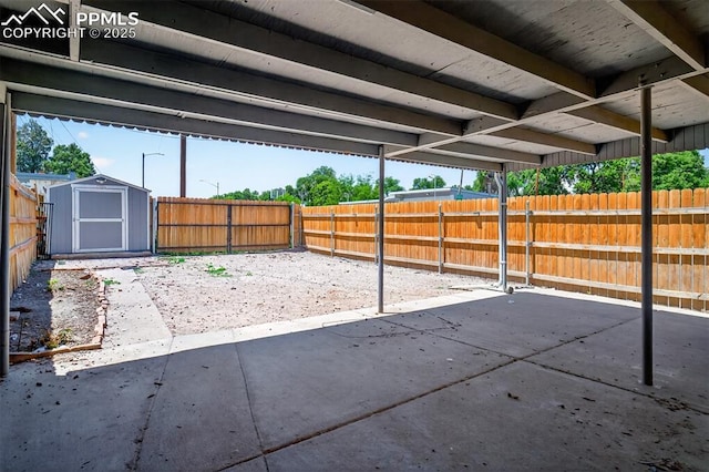1301 Cypress St, Pueblo, CO 81004 - fenced backyard featuring a patio and a shed