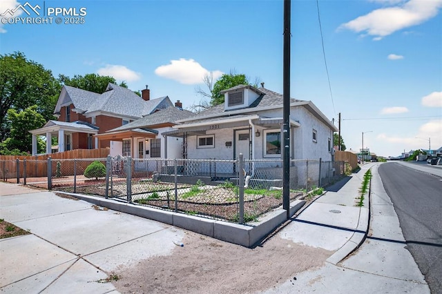 1301 Cypress St, Pueblo, CO 81004 - bungalow-style home featuring a fenced front yard