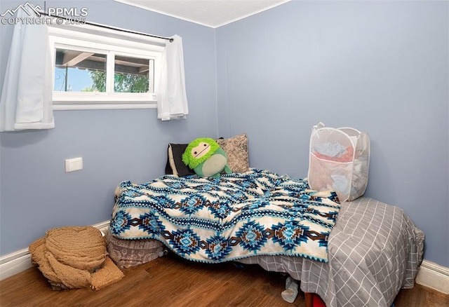 1301 Cypress St, Pueblo, CO 81004 - bedroom featuring wood finished floors and crown molding