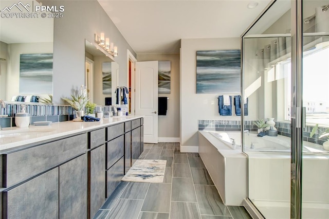 10708 Kentwood Dr, Colorado Springs, CO 80924 - full bath featuring double vanity, a bath, and a stall shower