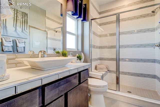 10708 Kentwood Dr, Colorado Springs, CO 80924 - full bath featuring a stall shower, vanity, and tile patterned flooring