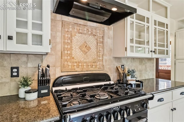 1326 E Platte Ave, Colorado Springs, CO 80909 - kitchen featuring gas range oven, range hood, white cabinets, tasteful backsplash, and glass insert cabinets