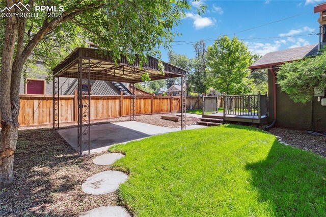 1326 E Platte Ave, Colorado Springs, CO 80909 - fenced backyard with a patio area and a deck
