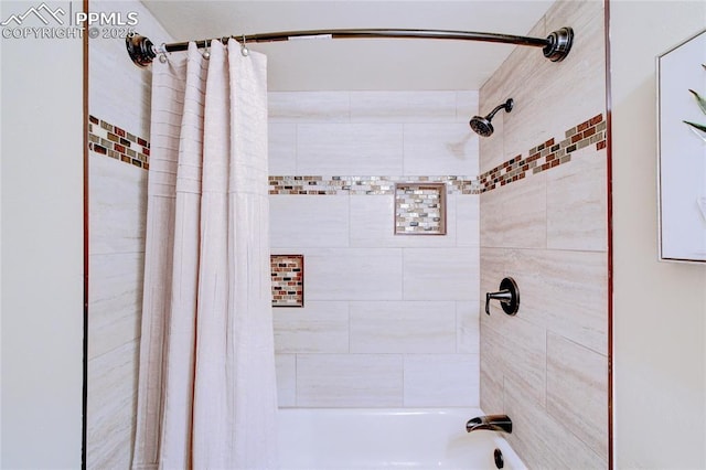 19235 Wakonda Way, Monument, CO 80132 - bathroom featuring shower / tub combo with curtain