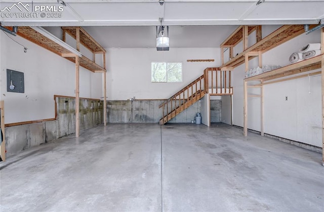 19235 Wakonda Way, Monument, CO 80132 - garage with electric panel and a garage door opener