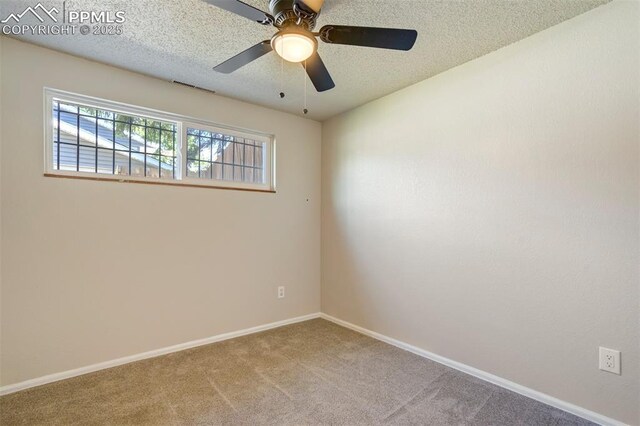 4116 Fitzpatrick Dr, Colorado Springs, CO 80909 - carpeted spare room featuring ceiling fan and a textured ceiling