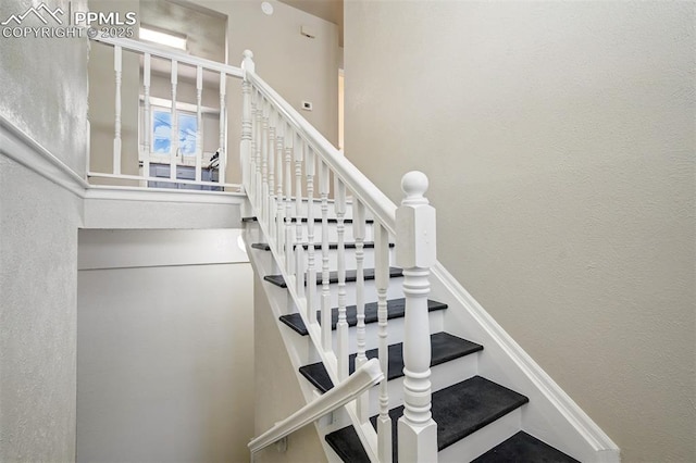 4116 Fitzpatrick Dr, Colorado Springs, CO 80909 - staircase with a textured wall
