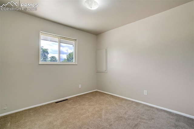 4116 Fitzpatrick Dr, Colorado Springs, CO 80909 - unfurnished room featuring carpet floors and baseboards