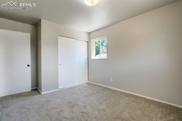 4116 Fitzpatrick Dr, Colorado Springs, CO 80909 - unfurnished bedroom featuring carpet and a closet