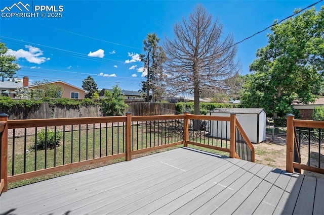 4116 Fitzpatrick Dr, Colorado Springs, CO 80909 - deck featuring a storage shed and a fenced backyard