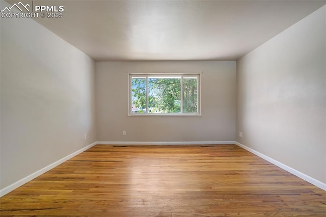 4116 Fitzpatrick Dr, Colorado Springs, CO 80909 - spare room featuring wood finished floors and baseboards