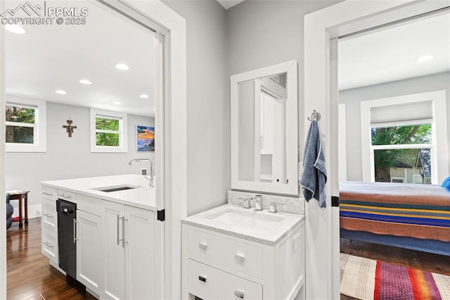 112 N 12th St, Colorado Springs, CO 80904 - full bath with vanity, wood finished floors, and recessed lighting