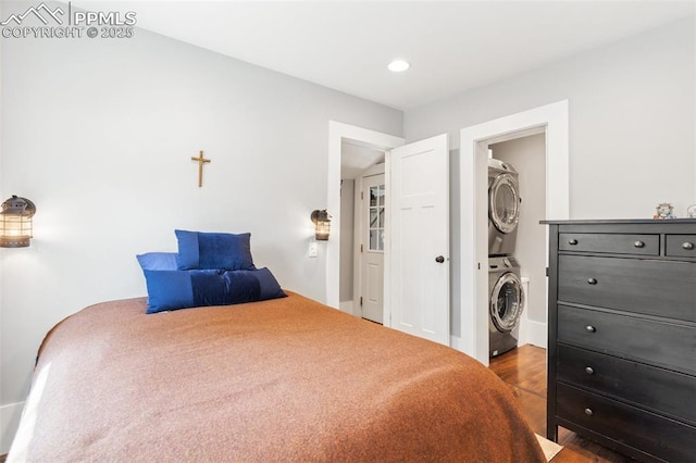 112 N 12th St, Colorado Springs, CO 80904 - bedroom with stacked washer / dryer, wood finished floors, and recessed lighting