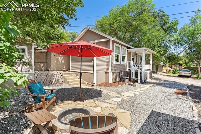 112 N 12th St, Colorado Springs, CO 80904 - view of patio / terrace with an outdoor fire pit