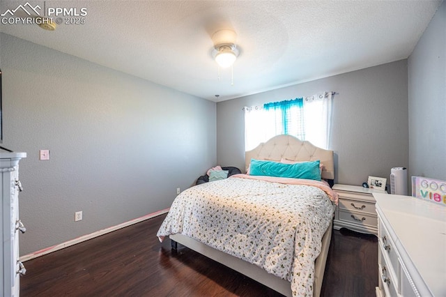 11310 Falling Star Rd, Fountain, CO 80817 - bedroom featuring dark wood finished floors and ceiling fan