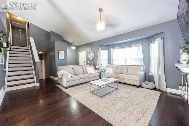 11310 Falling Star Rd, Fountain, CO 80817 - living area featuring lofted ceiling, a ceiling fan, wood finished floors, and stairway