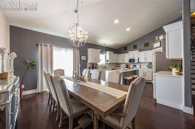 11310 Falling Star Rd, Fountain, CO 80817 - dining area with dark wood-type flooring, a chandelier, high vaulted ceiling, and recessed lighting