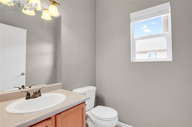 9344 Hirono Rd, Peyton, CO 80831 - half bathroom featuring toilet and vanity