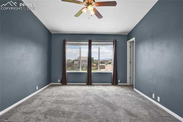 9344 Hirono Rd, Peyton, CO 80831 - spare room with ceiling fan, carpet, and a textured wall